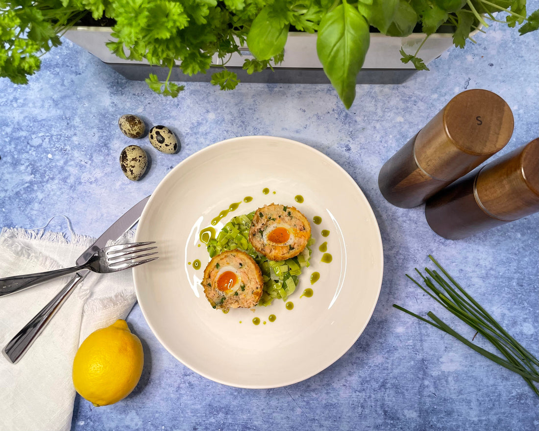 Hot smoked salmon scotch egg with creamed leeks Cole & Mason UK