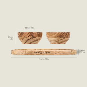 The Cole & Mason Portobello Olive Wood Pinch Pot Set includes two 58mm x 27mm bowls and a 120mm x 8mm tray. Each features unique grain patterns, making every piece distinct. All measurements are labeled.
