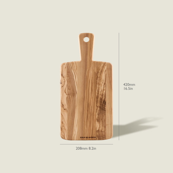 The Cole & Mason Portobello Olive Wood Serving Board, rectangular with a handle and measuring 420mm x 208mm, is displayed upright on a light background.