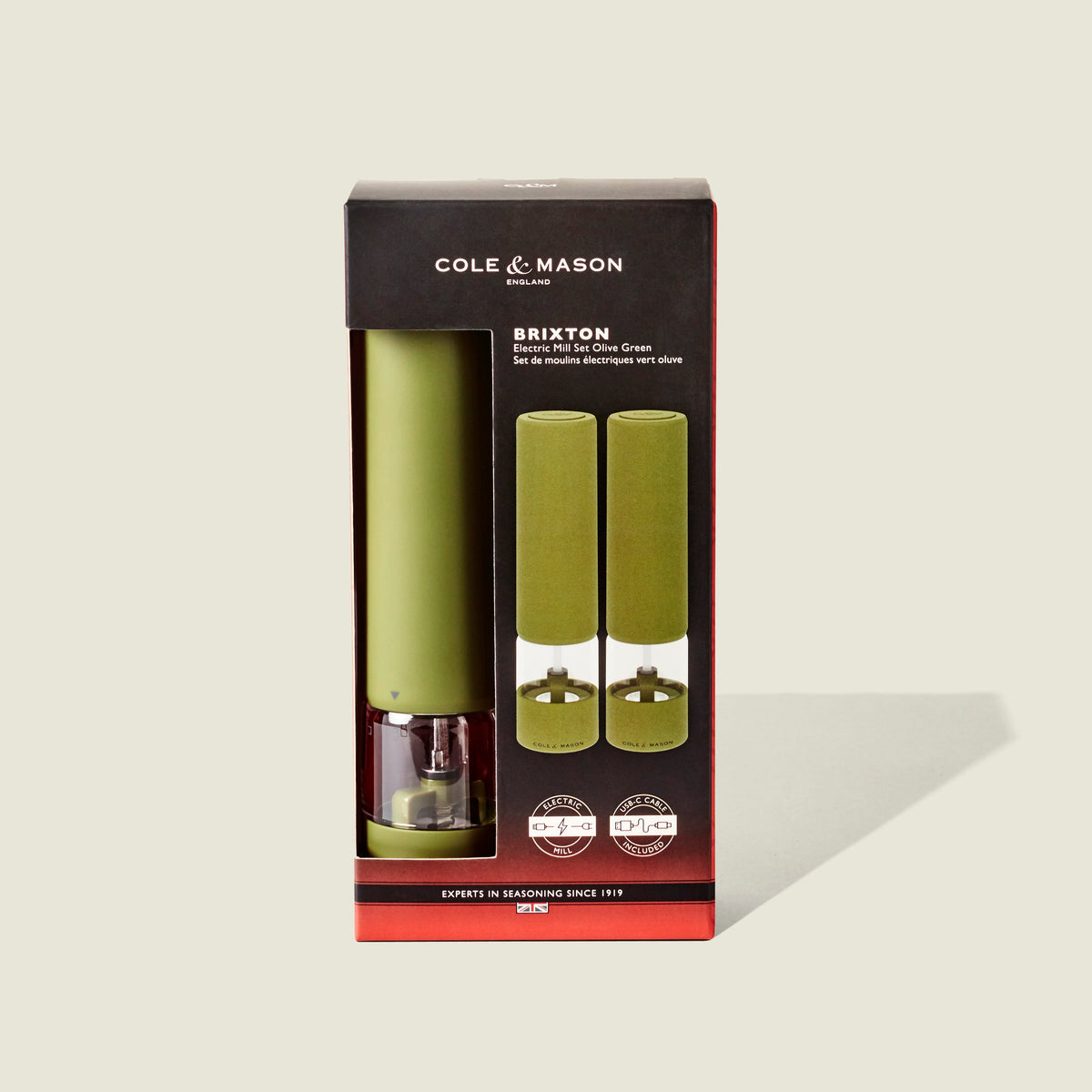 Cole & Mason Brixton Electric Mill Olive Green GS set, displayed in packaging with two mills visible through a front clear window. Designed for easy one-handed operation and equipped with robust ceramic grinders, the box features black and red accents along with white text.