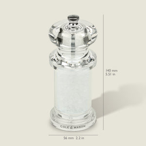 #salt
A clear acrylic Cole & Mason 505 Salt & Pepper Mill, filled with coarse salt and adjustable for precise grinding. Measures 140mm tall by 56mm wide. Shown against a light background with measurement lines.