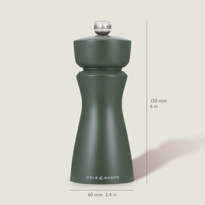 A dark green Kenton Rosemary Salt & Pepper Mill by Cole & Mason, with a ceramic mechanism and interchangeable knobs, stands upright at 150 mm tall and 60 mm wide on a light background.