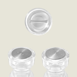 #86mm 
Three clear Cole & Mason London Acrylic Salt & Pepper Shakers are shown with silver tops; two stand upright displaying their holes, and one is upside down showing its solid base against a plain, light background.