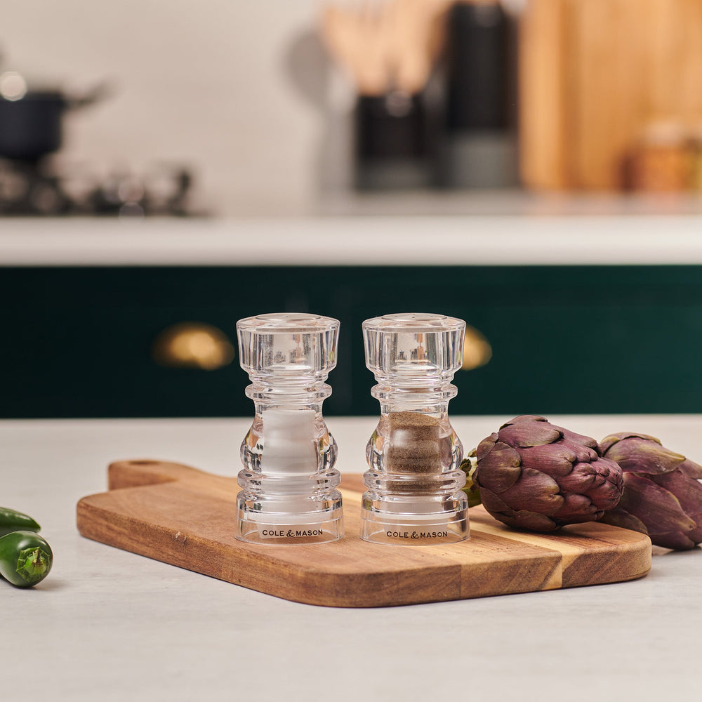 #130mm #shakerset Two Cole & Mason London Acrylic Salt & Pepper Shakers stand side by side on a neutral background, each with the brand name displayed at the base.