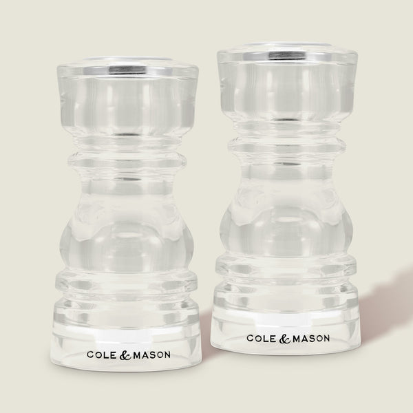 #130mm #shakerset Two Cole & Mason London Acrylic Salt & Pepper Shakers stand side by side on a neutral background, each with the brand name displayed at the base.